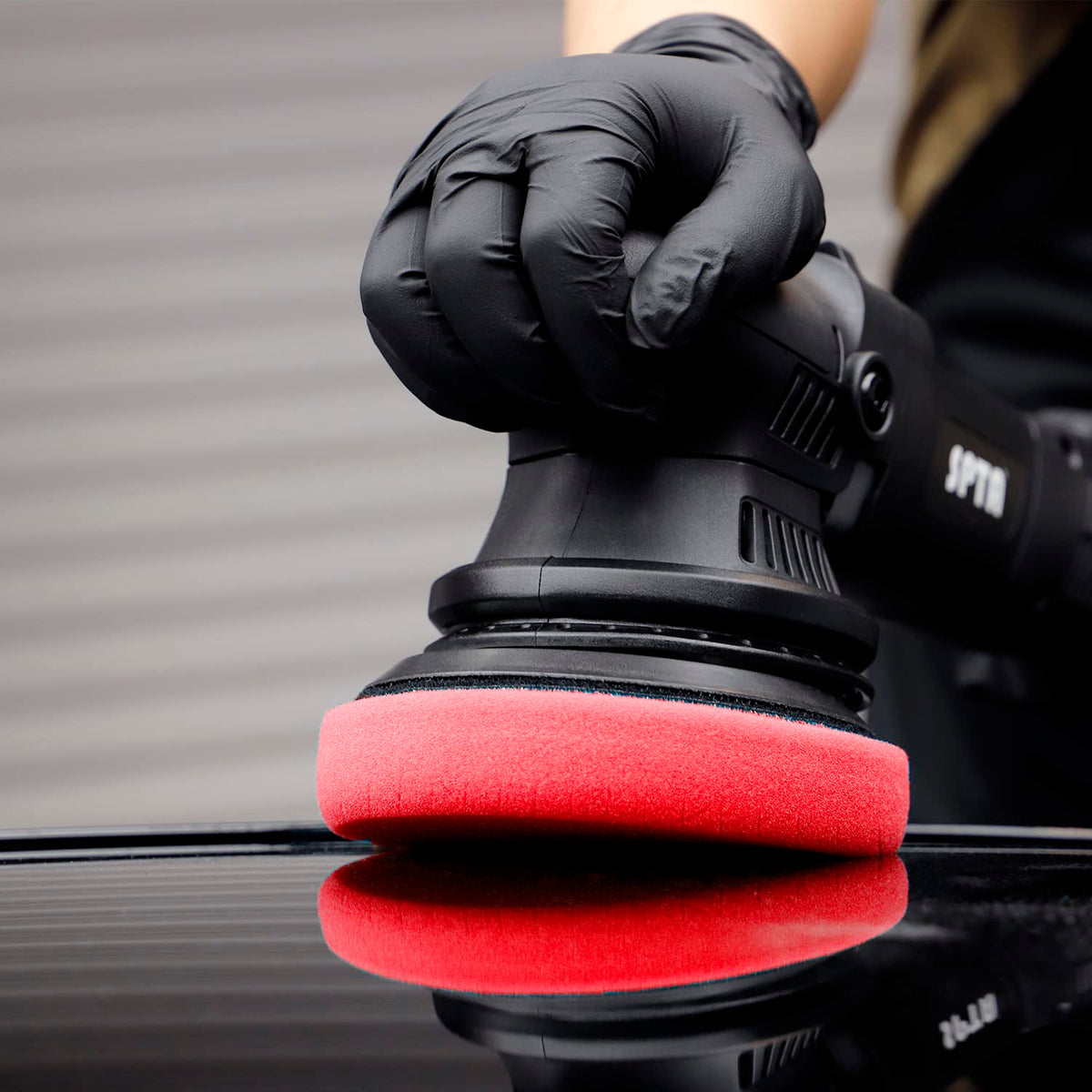 SPTA Red T10 three-pack staged with polisher and bottles for ready-to-use convenience