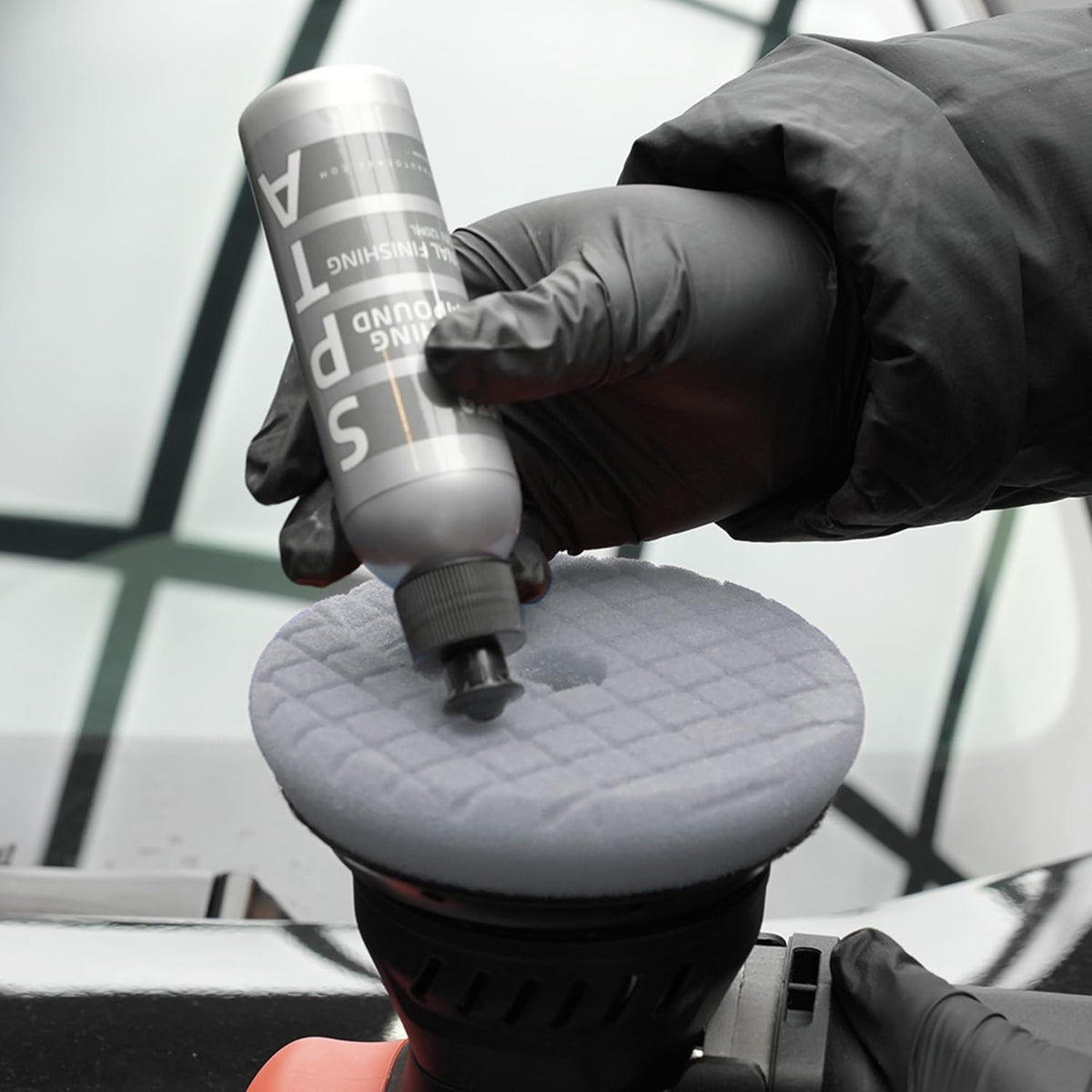 SPTA bottle in hand to show 120ml scale and ease of storage