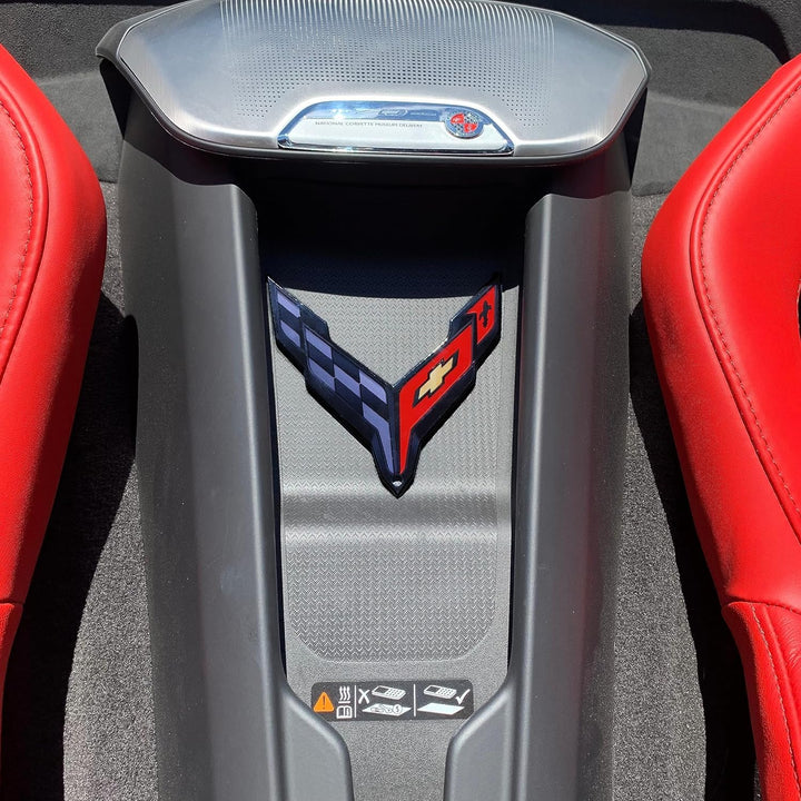 SR1 Performance front view of steel crossed‑flag emblem showing bold Corvette logo and premium finish