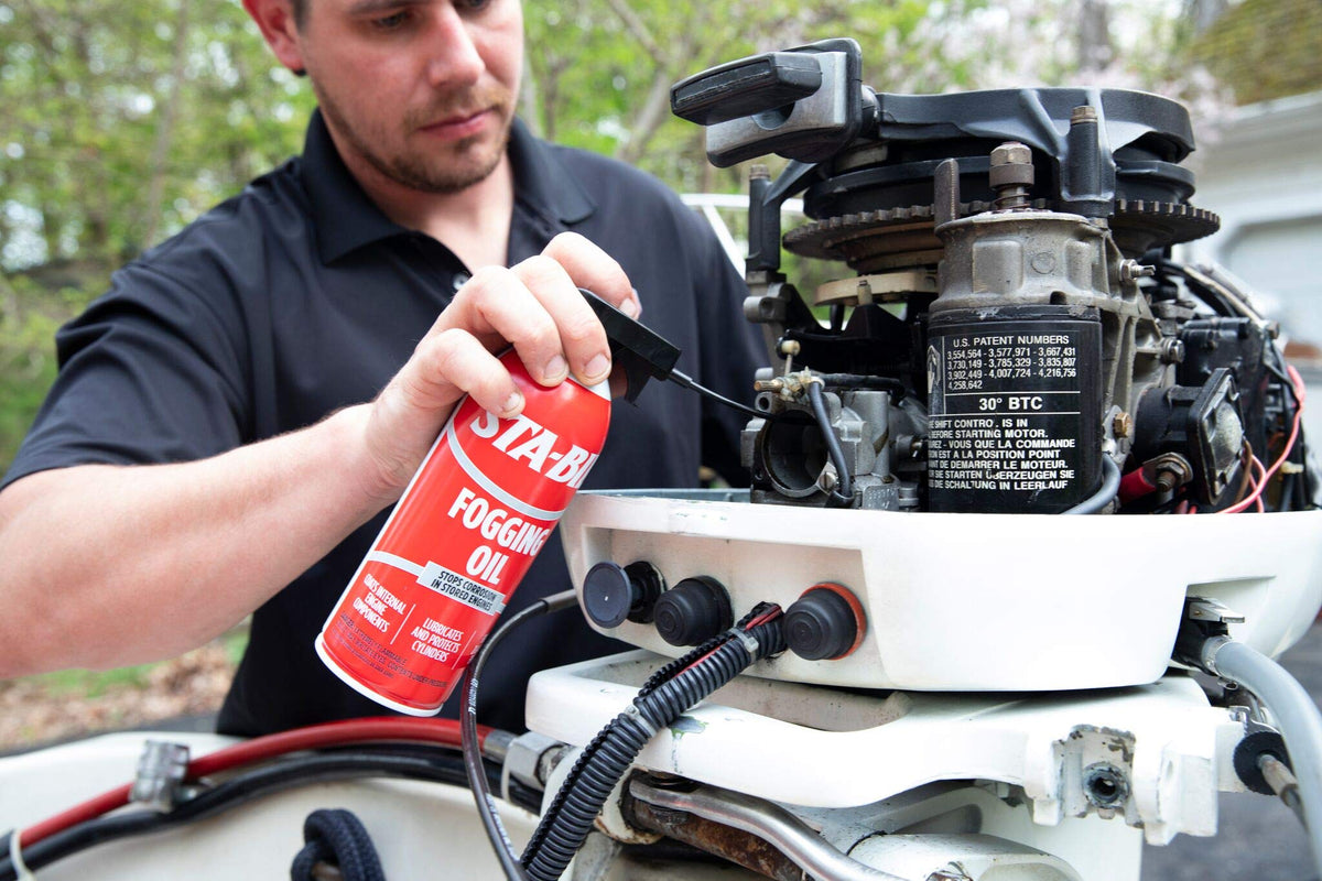 STA-BIL oil spray stream close-up demonstrating even internal coating