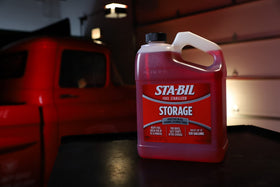 STA-BIL storage in a garage with tools highlighting protection for stored equipment