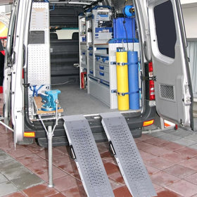 Stalwart ramp in use loading an ATV into a trailer for easier transport