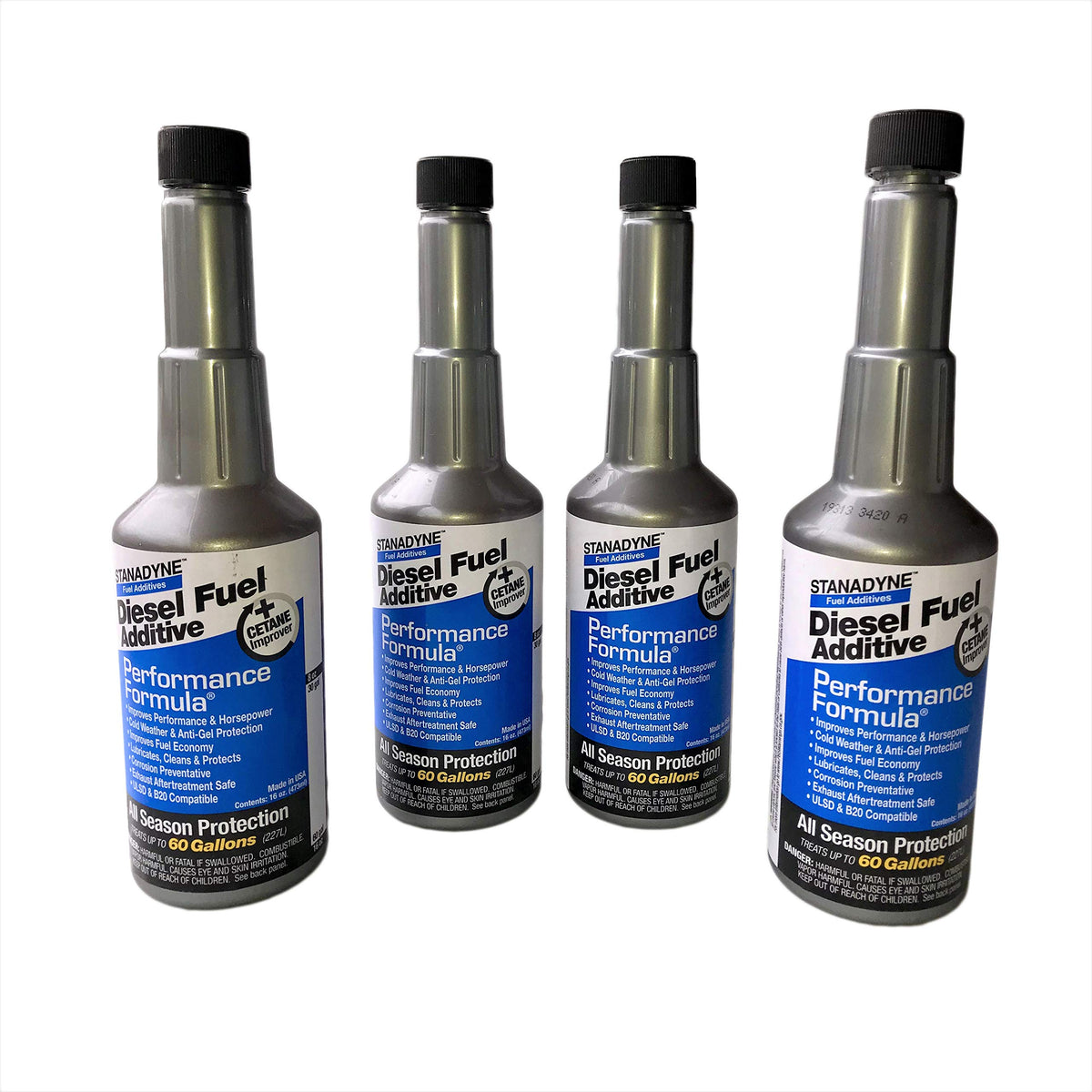 Stanadyne front pack showing four pint bottles and clear treatment benefits