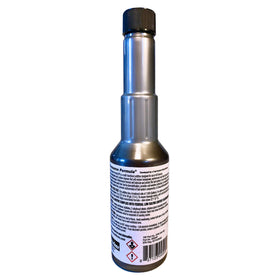 Stanadyne bottle held in hand showing 8oz size for easy storage