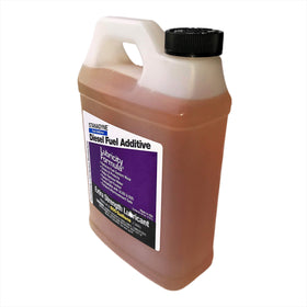 Pouring Stanadyne from jug into measuring cup for accurate dosing and protection