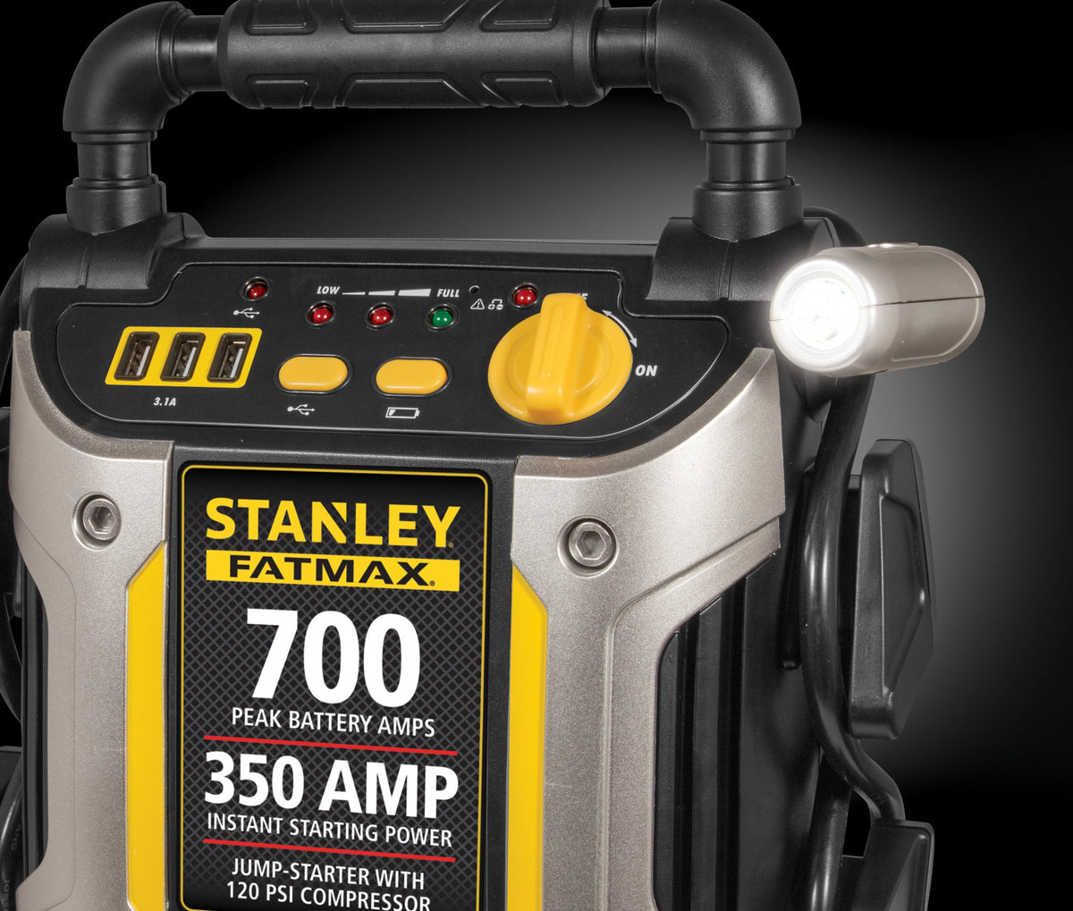 STANLEY rotating LED light illuminating a roadside scene for safe night work