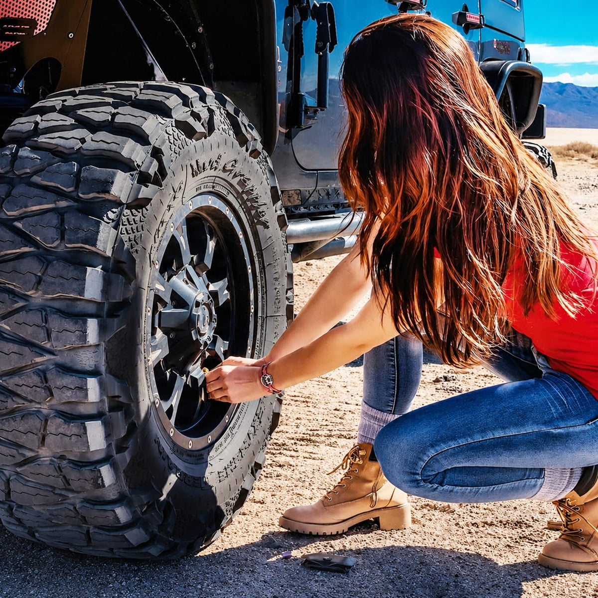 Staun engaging tyre valve at an angle for reachable valve stems