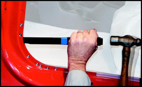 Steck Seam Buster close-up of sharpened tip and side edge highlighting durable alloy