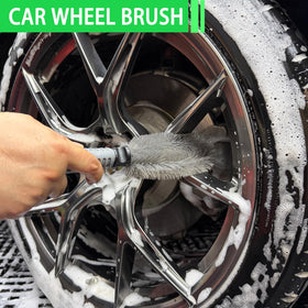 Stemni microfiber wash mitt being used by hand for gentle, controlled spot cleaning