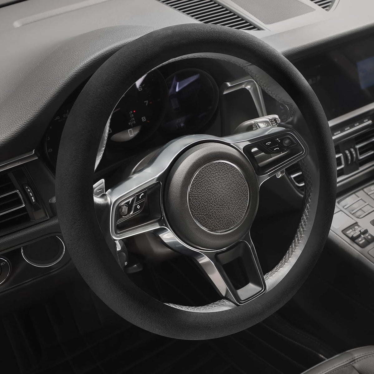 SthExtra cover installed on steering wheel demonstrating added control