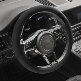 SthExtra cover installed on steering wheel demonstrating added control