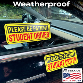 Learner driver with Stickios sticker on car in parking lot showing identification and courtesy benefit