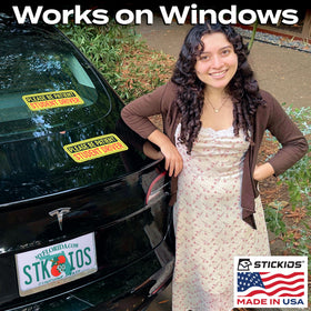 Stickios sticker on rear window showing secure adhesion and no paint risk benefit