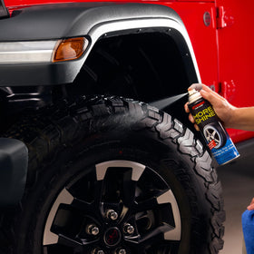 Stoner Car Care spraying onto tire demonstrating easy spray-on application benefit