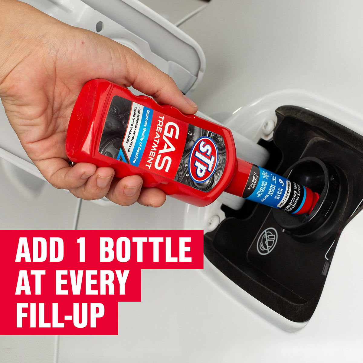 STP bottle next to hand showing 5.25 fl oz size and portability