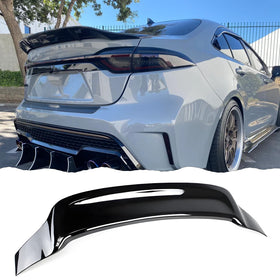 Sts.Ev01 front view installed on Corolla showing sleek rear styling benefit