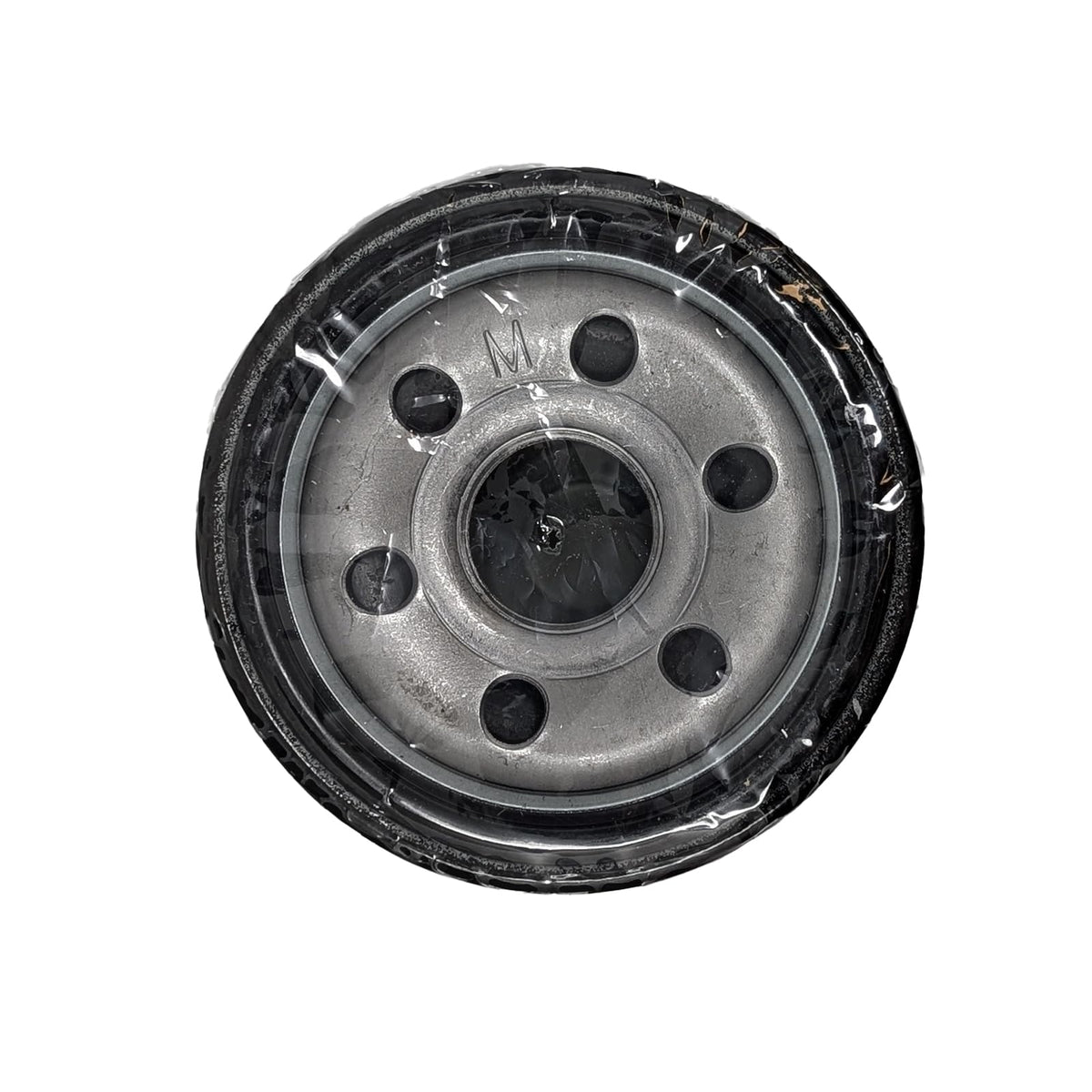 Subaru crush washer beside coin for scale, shows correct size for leak-free seal