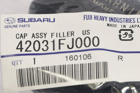 Subaru fuel cap installed in vehicle near fuel door illustrating correct fit and security