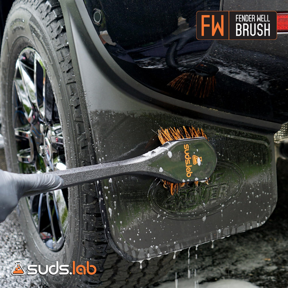 suds.lab brush cleaning a wheel well removing road grime efficiently