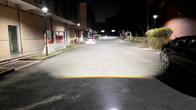 SUFEMOTEC nighttime beam pattern photo showing focused, wide illumination and fog penetration benefit