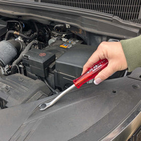 Sunflag tool in use on door panel illustrating safe clip extraction without damage
