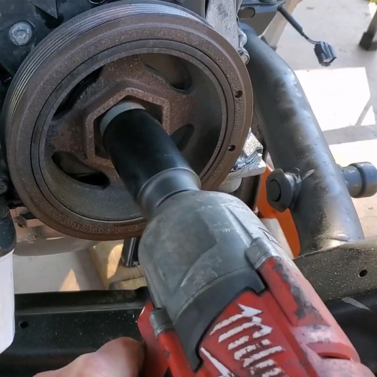 Sunluway socket installed on crank bolt inside engine bay for practical use