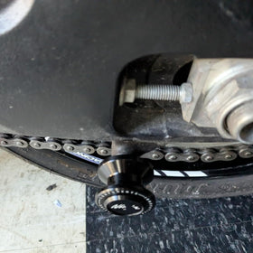 Super Vici spool with paddock stand in use demonstrating safe rear-wheel elevation