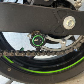 Super Vici spool next to wrench for scale showing compact size and lightweight strength