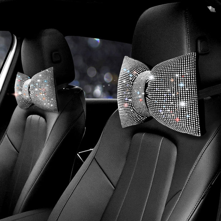 surpassme front view of two rhinestone neck pillows showcasing bling bow and color