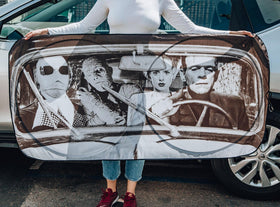 Surreal Entertainment sunshade beside ruler for size comparison demonstrating the 64x32-inch fit