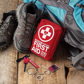 Swiss Safe kit at campsite providing compact emergency supplies for outdoor trips