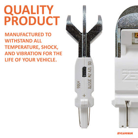 SYLVANIA warranty card and manual laid flat showing lifetime warranty and instructions
