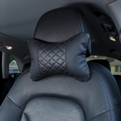 Synterior front view of two black headrest pillows showing coordinated style and comfort