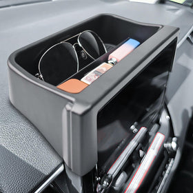 TACOBRO lifestyle shot inside car showing organized cabin benefit