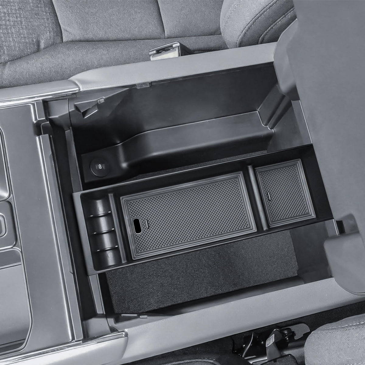 TACOBRO lifestyle shot in truck interior showing tidy, quiet console