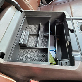 TACOBRO lifestyle truck interior showing a tidy console and organized cabin benefit