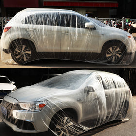 Tallew cover fully draped over a sedan showing full exterior protection from weather