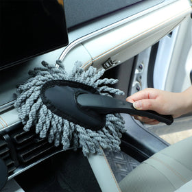 Tanlade small brush cleaning seat seam highlighting detail work and safe fabric care