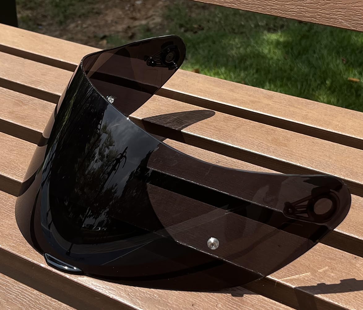 TAOHOM visor held in hand for scale showing slim, lightweight durability