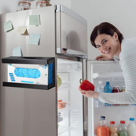 Tcevily mounted on kitchen wall showing convenient wipe access benefit