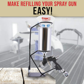 TCP Global holder next to spray gun for scale, shows compact size and stability