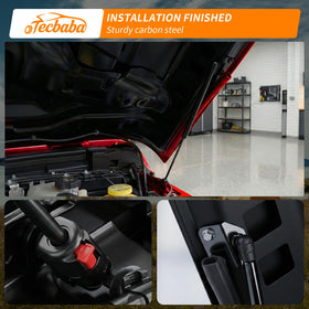 Tecbaba in garage while owner performs maintenance showing practical convenience