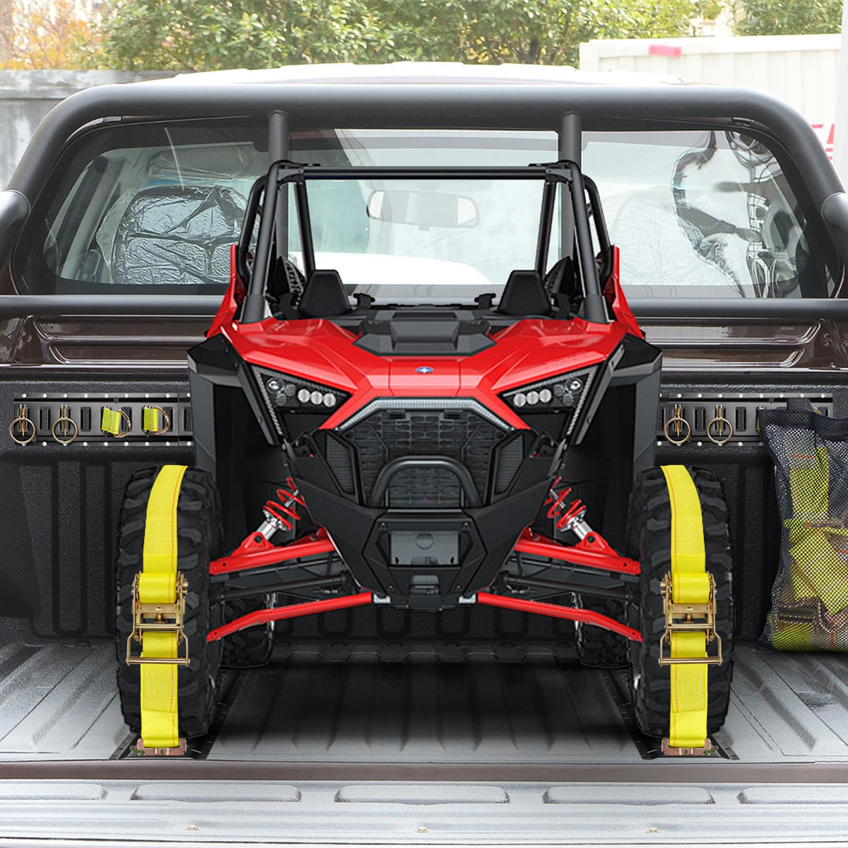TEKCHIC straps securing an ATV inside a trailer demonstrating stable transport