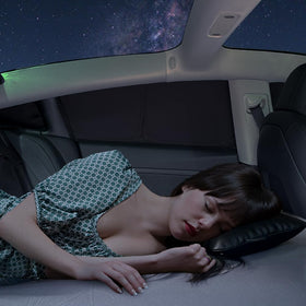 TESBEAUTY lifestyle shot of Model 3 camped showing privacy and cozy interior