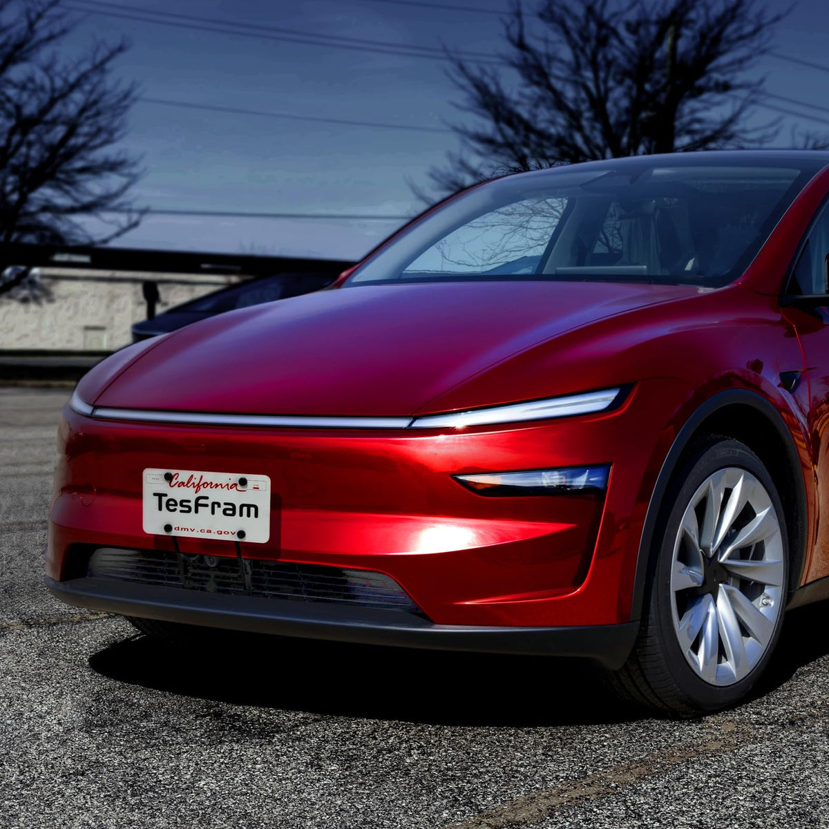 TesFram installed on Model Y Juniper in driveway for aesthetic integration