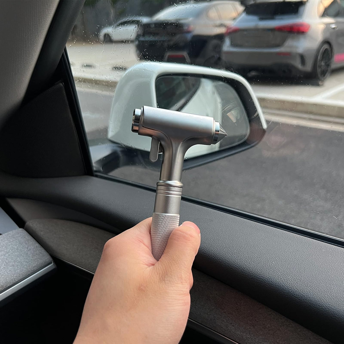 Tesheer striking a car window demonstrating efficient glass fracture