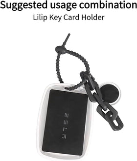 Tesla key card next to credit card showing compact size and portability