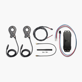 Tesla Remote Meter close-up of included 200A current transformer and RS-485 harness for accurate load sensing