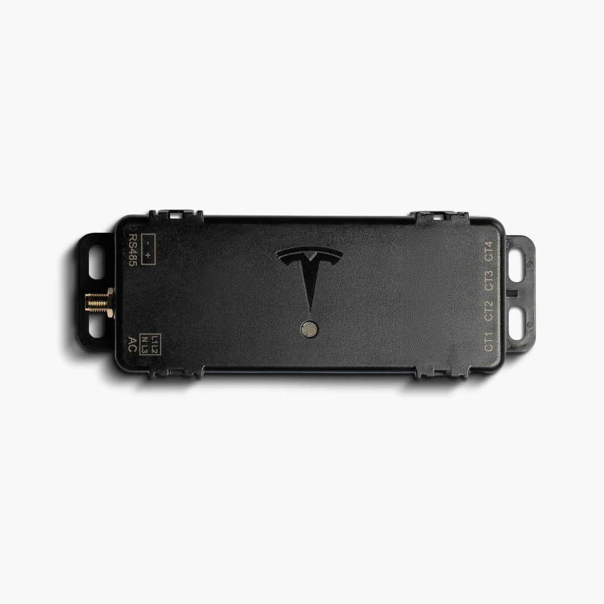 Tesla Remote Meter front view showing compact module and connectors for easy installation and reliability