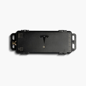 Tesla Remote Meter front view showing compact module and connectors for easy installation and reliability